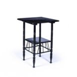 In the manner of Edward William Godwin (1833-1886) Ebonised occasional table, with spindle supports,