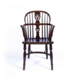 William Wheatland at Rockley Yew wood Windsor chair, with pierced splat, and crinoline stretcher,
