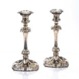 Pair of Georgian silver candlesticks with loaded bases, of square knopped form, bearing marks for