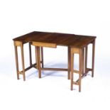 Fred Francis Foster (20th Century Cotswold School) Metamorphic occasional table, walnut with