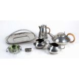 In the manner of Archibald Knox (1864-1933) collection of pewter items in the Tudric style,