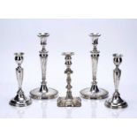 Silver and silver plated candlesticks consisting of: the silver-plated pair 29.5cm high overall, a