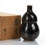 Katsuyuki Shinohara (Contemporary) Japanese studio pottery wine storage jar with iron glaze, incised