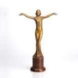 In the manner of Ferdinand Preiss (1882-1943) Art Deco style gilt painted metal figure of a lady,