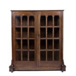 Attributed to Gustav Stickley (1858-1942) oak, '510' type glazed bookcase, glass panels to both