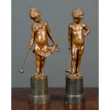 Franz Iffland (1862-1935) Boy and girl playing croquet, a pair, bronze, each signed to the reverse
