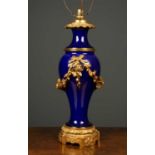 A cobalt blue porcelain lamps of baluster form, with gilded mounts, 48cm in height excluding