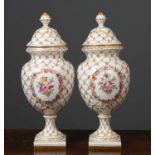 A pair of Carl Thieme Dresden pottery jars and covers in the Maria Teresa pattern, circa 1900,