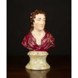 A 19th century Staffordshire Pottery bust of Matthew Prior, circa.1805, on marble effect pottery
