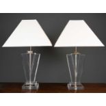 A pair of art deco style lucite late 20th century table lamps each of waisted form and on stepped