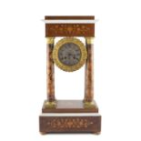 A 19th century French rosewood and foliate inlaid portico mantel clock with silvered roman dial,