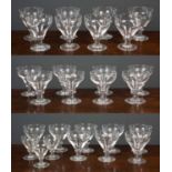 A large suite of antique glassware comprising eight large glasses, 14cm high; eight medium