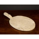 A Robert Thompson 'Mouseman' oval cheese board 38cm long x 20cm deepCondition report: Wood faded