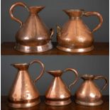 A group of five copper Haystack measures, two stamped 'L Lumley 1 America Square London and '4