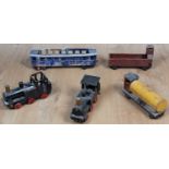 A group of Danish mid 20th century Uncle Harald wooden trains comprising two engines and three