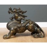 A decorative Oriental bronzed dog of fo in an alert position, 66cm long x 48cm highCondition report: