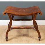 A Chippendale style mahogany hall stool the shaped top with scrolling ends, shaped fluted legs