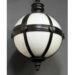 A lacquered black painted spherical hanging lantern with opalescent glass, approximately 48cm