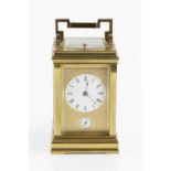 A late 19th century French carriage clock, the white enamel roman dial over a subsidiary alarm