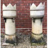 A pair of crown topped chimney pots in buff terracotta, 36cm diameter at the top x 36cm square at