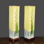 A pair of chinese square section table lamps, the pale green ceramic base with cut out motif on