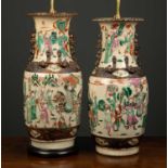 A pair of 19th century Chinese crackleware vases converted to lamps, decorated with polychrome