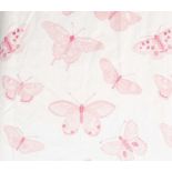 Two pairs of cream ground linen curtains decorated with pink butterflies and a silk band towards the