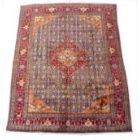 A modern Middle Eastern Persian style fine Bijaar red, blue and orange ground rug 290cm x