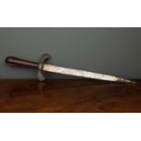 A Quillon dagger, possibly early 17th century, with fluted tapering fruitwood grip, curved