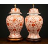 A pair of modern Oriental porcelain table lamps of baluster vase form, each on turned wood bases,