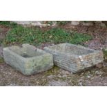 Two low stone troughs or planters 63cm wide x 33cm deep x 17.5cm high and 58cm wide x 31cm deep x