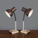 A pair of Herbert Terry anglepoise goose neck lamps model 99, with brown metal shade on adjustable