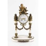A 19th century French gilt brass and white marble drum head mantel clock with convex white enamel