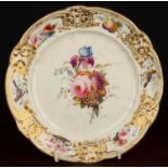A 19th century Nantgarw porcelain plate, hand decorated with central floral spray within a relief