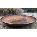 A large spun steel fire bowl, approximately 120cm diameter x 24cm highQty: 1Condition report: Rusted