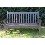 A brown painted hardwood two seater garden bench by Lister Dursley Glos, with shaped arms, 160cm