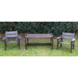 A group of garden furniture comprising a hardwood garden table of plank and peg construction,