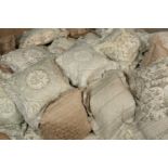 A large collection of feather filled cushions many for upholsteryCondition report: for reupholstery,