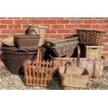 A collection of baskets to include a willow lidded oval basket with rush handle, 65cm wide x 51cm