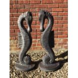 A pair of modern cast stone bronzed sea horse sculptures on oval plinth base, 25cm wide x 33cm