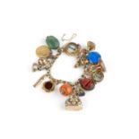 A charm bracelet, the fancy curb-link bracelet alternately set with half pearls and turquoise