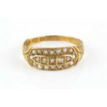 A late Victorian half pearl and diamond dress ring, centred with a line of five single-cut diamonds,