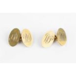 A pair of 9ct gold cufflinks, each oval panel with engraved monogram, on chain-link fittings,