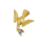 A Victorian gem set bird brooch, naturalistically modelled as a bird in flight, with feather-