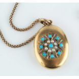 A late Victorian half pearl set locket pendant, the oval locket applied with a snowflake cluster