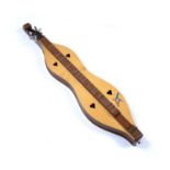 An Appalachian Dulcimer, the body with heart shaped sound holes and kingfisher motif decoration,