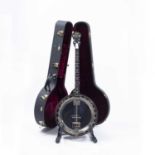 A Deering Sierra Tenor Banjo serial no. 011986008399, the body with ivorine banded decoration,