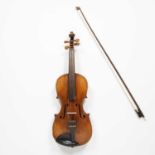 A late 19th century three quarter size violin with single piece back, 33.5cm; together with bow,