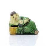 Famille verte figural inkwell Chinese, Ming dynasty in the form of 'Mr Lei', leaning with his