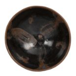 Cizhou black ware bowl Chinese, 12th/13th Century covered in a black/brown glaze with a russet